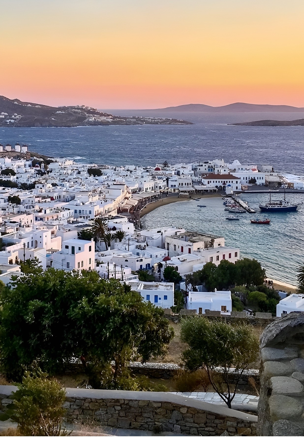 View over Mykonos town and the sea at dusk
